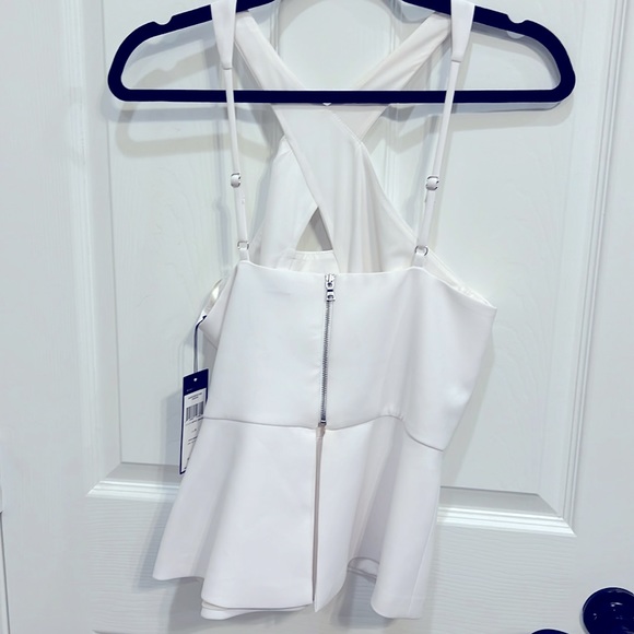 Never worn, white BCBG white halter top. Very classy and timeless - Picture 3 of 4